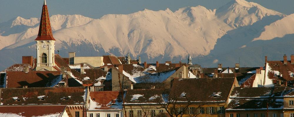 Reformed Church - Sibiu Romania with Negoiu Peak